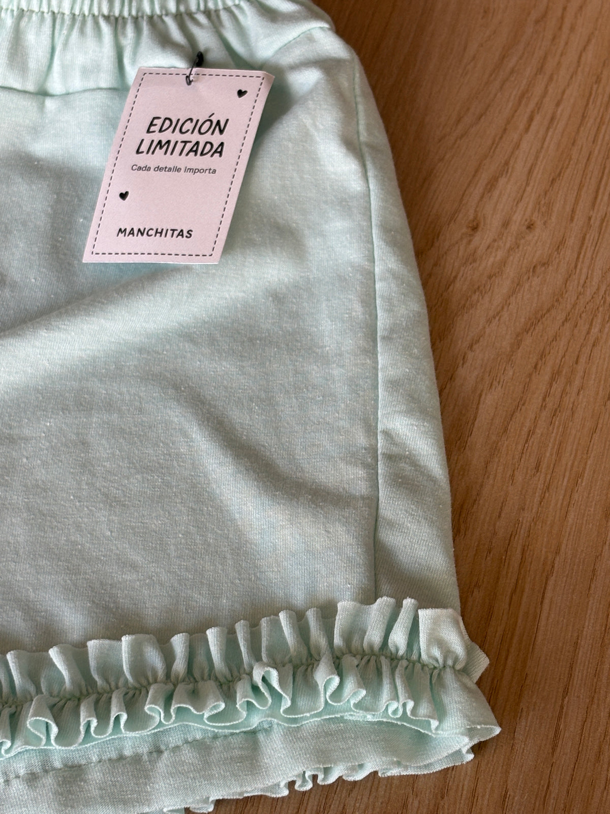 Short with simil ruffles