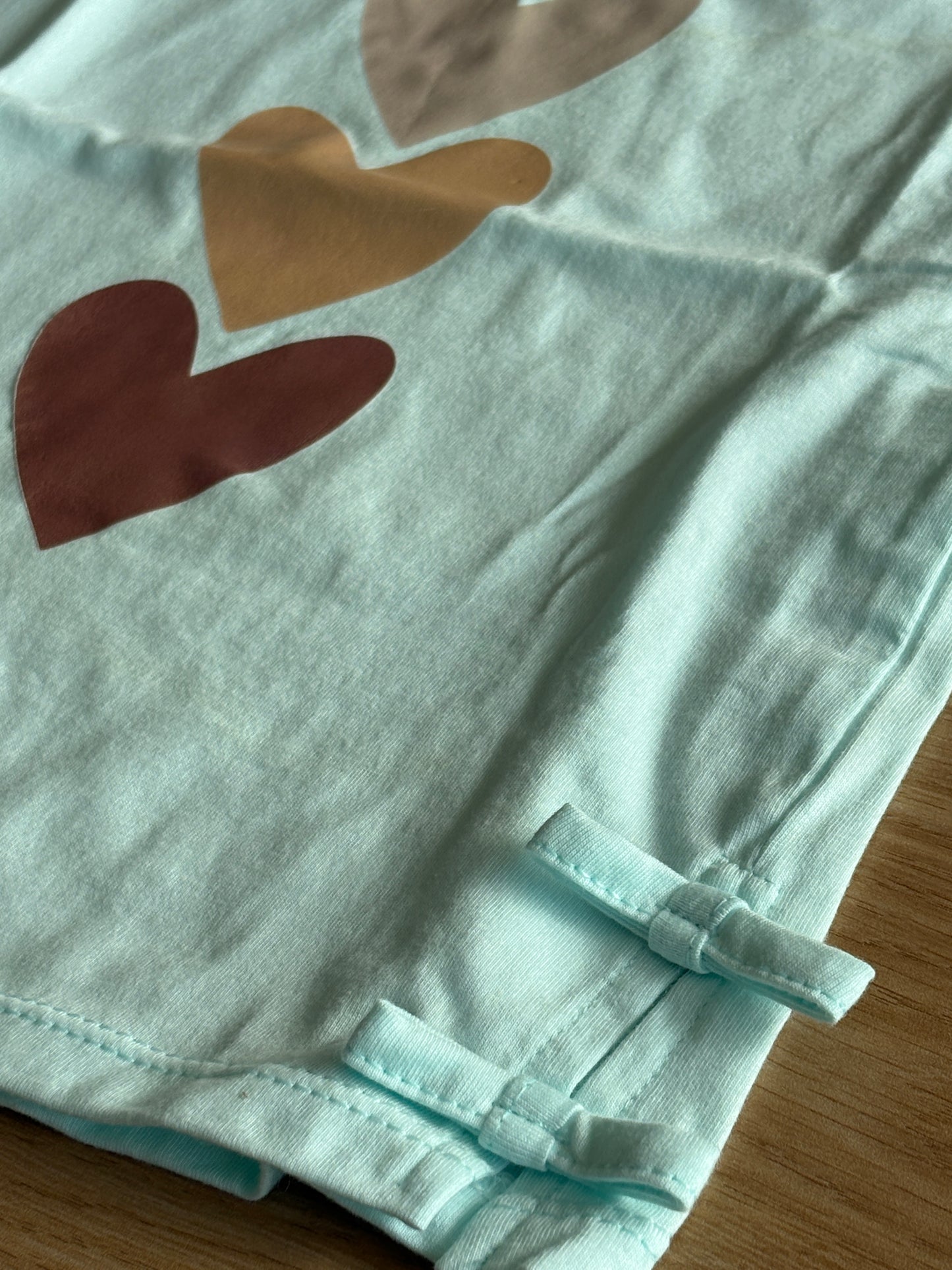 Green T-shirt with bow