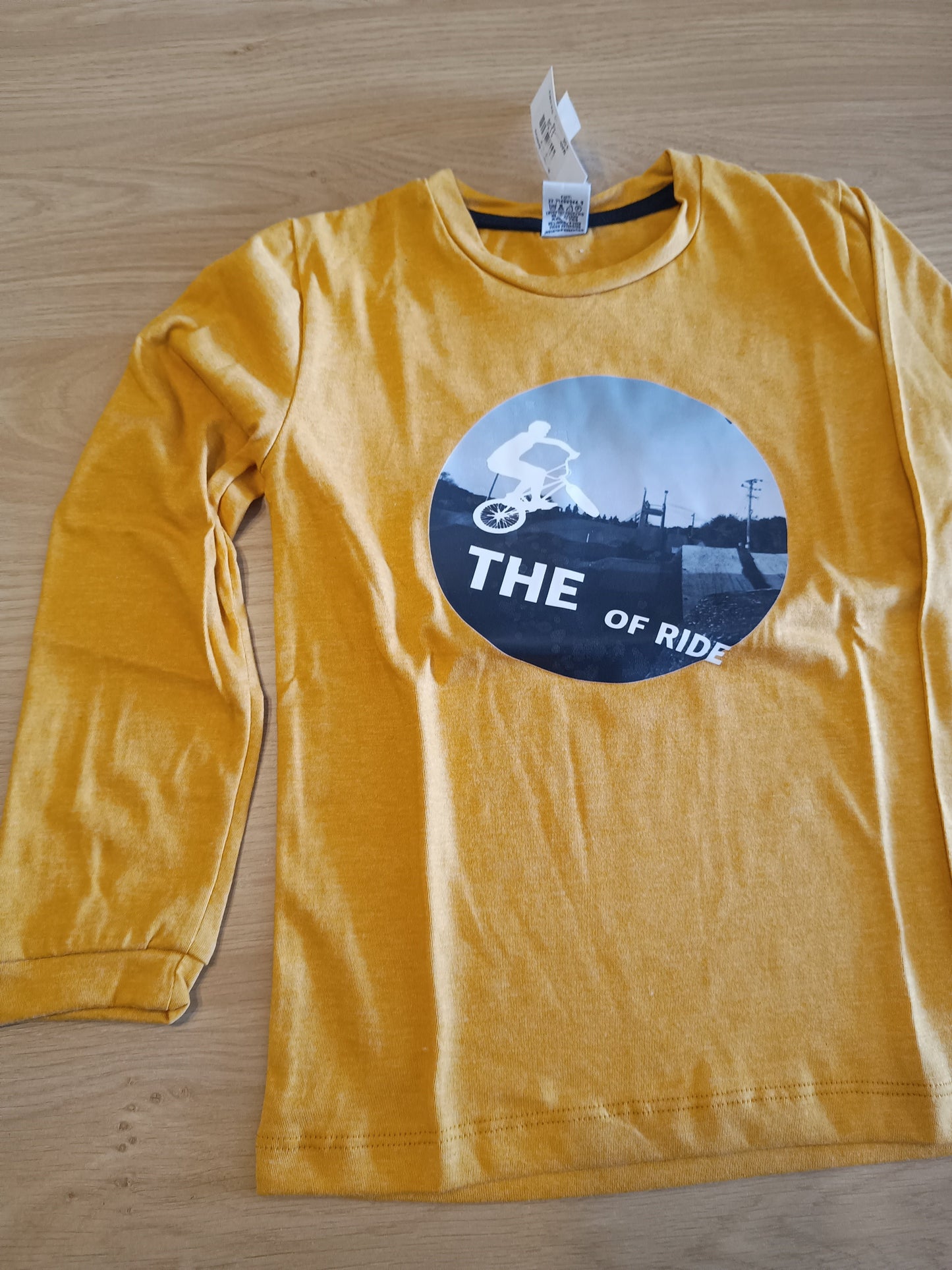 tshirt brown bicycle boy