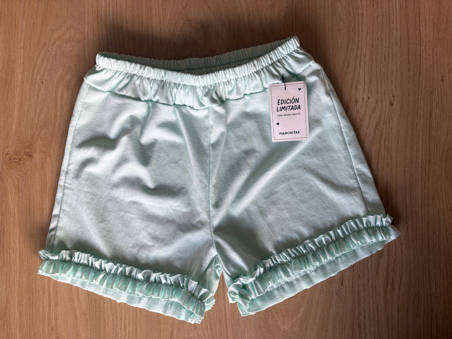 Short with simil ruffles